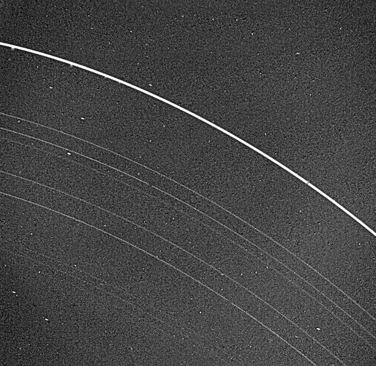 Voyager 2 image of Uranus's nine known rings, taken on 22 January 1986 from 2.52 million km away.